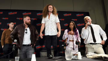 NEW YORK, NEW YORK - OCTOBER 04: (L-R) Jon Moxley, Jack Perry aka Jungle Boy, Brandi Rhodes, and Cody Rhodes attends the All Elite Wrestling panel during 2019 New York Comic Con at Jacob Javits Center on October 04, 2019 in New York City. (Photo by Noam Galai/Getty Images for WarnerMedia Company)