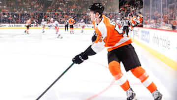 PHILADELPHIA, PENNSYLVANIA - APRIL 13: Egor Zamula #54 of the Philadelphia Flyers skates with the puck against the New York Rangers at Wells Fargo Center on April 13, 2022 in Philadelphia, Pennsylvania. (Photo by Tim Nwachukwu/Getty Images)