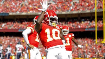 Tyreek Hill #10 of the Kansas City Chiefs celebrates after his third quarter touchdown reception (Photo by David Eulitt/Getty Images)
