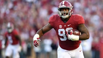 Oct 22, 2016; Tuscaloosa, AL, USA; Alabama Crimson Tide defensive lineman Jonathan Allen (93) returns a fumble for a touchdown against the Texas A&M Aggies during the third quarter at Bryant-Denny Stadium. Mandatory Credit: John David Mercer-USA TODAY Sports