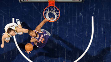 INDIANAPOLIS, IN - JANUARY 24: Greg Monroe #14 of the Phoenix Suns rebounds the ball during the game against the Indiana Pacers on January 24, 2018 at Bankers Life Fieldhouse in Indianapolis, Indiana. NOTE TO USER: User expressly acknowledges and agrees that, by downloading and or using this Photograph, user is consenting to the terms and conditions of the Getty Images License Agreement. Mandatory Copyright Notice: Copyright 2018 NBAE (Photo by Ron Hoskins/NBAE via Getty Images)