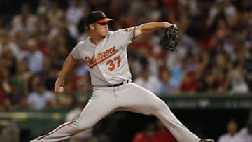 Jun 15, 2016; Boston, MA, USA; Baltimore Orioles pitcher Dylan Bundy (37) delivers a pitch during the eighth inning against the Boston Red Sox at Fenway Park. Mandatory Credit: Greg M. Cooper-USA TODAY Sports