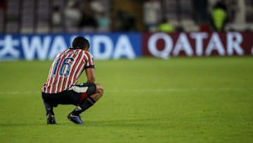 AL AIN, UNITED ARAB EMIRATES - DECEMBER 15: A dejected Miguel Ponce of CD Guadalajara at full time during the FIFA Club World Cup UAE 2018 match between Kashima Antlers and CD Guadalajara at Hazza Bin Zayed Stadium on December 15, 2018 in Al Ain, United Arab Emirates. (Photo by Matthew Ashton - AMA/Getty Images)