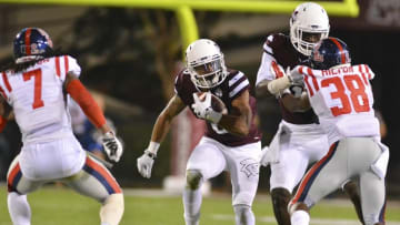 Nov 28, 2015; Starkville, MS, USA; Mississippi State Bulldogs wide receiver Fred Ross (8) runs the ball during the third quarter of the game against the Mississippi Rebels at Davis Wade Stadium. Mississippi won 38-27. Mandatory Credit: Matt Bush-USA TODAY Sports