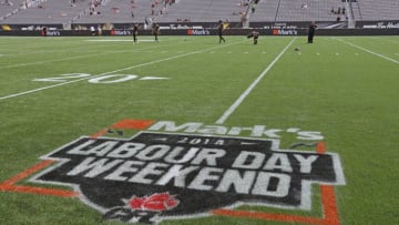 Labour Day Classic logo on the field prior to play between the Toronto Argonauts and the Hamilton Tiger-Cats in a CFL football game. (Photo by Claus Andersen/Getty Images)