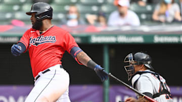Apr 11, 2021; Cleveland, Ohio, USA; Cleveland Indians designated hitter Franmil Reyes (32) hits an RBI single during the eighth inning against the Detroit Tigers at Progressive Field. Mandatory Credit: Ken Blaze-USA TODAY Sports