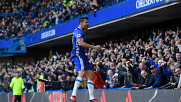 Chelsea's Brazilian-born Spanish striker Diego Costa celebrates after scoring the opening goal of the English Premier League football match between Chelsea and West Bromwich Albion at Stamford Bridge in London on December 11, 2016. / AFP / Justin TALLIS / RESTRICTED TO EDITORIAL USE. No use with unauthorized audio, video, data, fixture lists, club/league logos or 'live' services. Online in-match use limited to 75 images, no video emulation. No use in betting, games or single club/league/player publications. / (Photo credit should read JUSTIN TALLIS/AFP/Getty Images)
