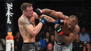 SUNRISE, FL - APRIL 27: (R-L) Jacare Souza of Brazil punches Jack Hermansson of Sweden in their middleweight bout during the UFC Fight Night event at BB&T Center on April 27, 2019 in Sunrise, Florida. (Photo by Jeff Bottari/Zuffa LLC/Zuffa LLC via Getty Images)