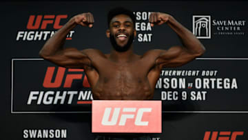 FRESNO, CA - DECEMBER 08: Aljamain Sterling poses on the scale during the UFC Fight Night weigh-in inside Valdez Hall on December 8, 2017 in Fresno, California. (Photo by Jeff Bottari/Zuffa LLC/Zuffa LLC via Getty Images)