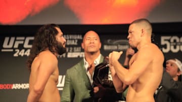 Jorge Masvidal and Nate Diaz square off with The Rock at the UFC 244 ceremonial weigh-ins on Friday in New York City (photo by Amy Kaplan/FanSided)
