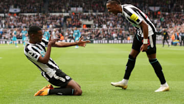 NEWCASTLE UPON TYNE, ENGLAND - APRIL 23: Alexander Isak of Newcastle United celebrates with teammate Joe Willock (R) after scoring the team's fourth goal during the Premier League match between Newcastle United and Tottenham Hotspur at St. James Park on April 23, 2023 in Newcastle upon Tyne, England. (Photo by Clive Brunskill/Getty Images)