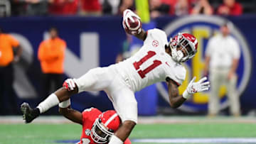ATLANTA, GA - DECEMBER 01: Deandre Baker #18 of the Georgia Bulldogs tackles Henry Ruggs III #11 of the Alabama Crimson Tide in the first half during the 2018 SEC Championship Game at Mercedes-Benz Stadium on December 1, 2018 in Atlanta, Georgia. (Photo by Scott Cunningham/Getty Images)
