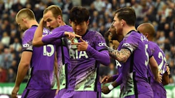 Tottenham Hotspur's South Korean striker Son Heung-Min (C) celebrates with teammates after scoring their third goal during the English Premier League football match between Newcastle United and Tottenham Hotspur at St James' Park in Newcastle-upon-Tyne, north east England on October 17, 2021. - RESTRICTED TO EDITORIAL USE. No use with unauthorized audio, video, data, fixture lists, club/league logos or 'live' services. Online in-match use limited to 120 images. An additional 40 images may be used in extra time. No video emulation. Social media in-match use limited to 120 images. An additional 40 images may be used in extra time. No use in betting publications, games or single club/league/player publications. (Photo by Paul ELLIS / AFP) / RESTRICTED TO EDITORIAL USE. No use with unauthorized audio, video, data, fixture lists, club/league logos or 'live' services. Online in-match use limited to 120 images. An additional 40 images may be used in extra time. No video emulation. Social media in-match use limited to 120 images. An additional 40 images may be used in extra time. No use in betting publications, games or single club/league/player publications. / RESTRICTED TO EDITORIAL USE. No use with unauthorized audio, video, data, fixture lists, club/league logos or 'live' services. Online in-match use limited to 120 images. An additional 40 images may be used in extra time. No video emulation. Social media in-match use limited to 120 images. An additional 40 images may be used in extra time. No use in betting publications, games or single club/league/player publications. (Photo by PAUL ELLIS/AFP via Getty Images)