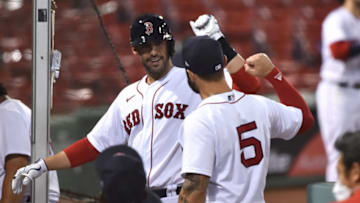 Aug 10, 2020; Boston, Massachusetts, USA; Boston Red Sox left fielder J.D. Martinez (28) is congratulated by center fielder Kevin Pillar (5) after hitting a home run during the third inning against the Tampa Bay Rays at Fenway Park. Mandatory Credit: Bob DeChiara-USA TODAY Sports