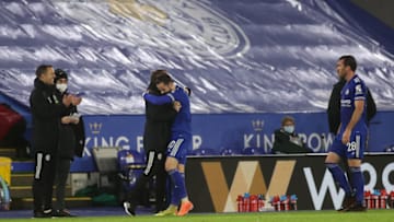 James Maddison of Leicester City celebrates with Brendan Rogers (Photo by Carl Recine - Pool/Getty Images)
