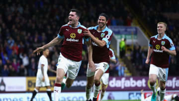 BURNLEY, ENGLAND - SEPTEMBER 26: Michael Keane of Burnley (L) celebrates scoring his sides second goal with team George Boyd of Burnley (R) during the Premier League match between Burnley and Watford at Turf Moor on September 26, 2016 in Burnley, England. (Photo by Clive Brunskill/Getty Images)