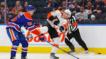 Feb 21, 2023; Edmonton, Alberta, CAN; Philadelphia Flyers forward James van Riemsdyk (25) takes a shot in front of Edmonton Oilers defensemen Philip Broberg (86) during the second period at Rogers Place. Mandatory Credit: Perry Nelson-USA TODAY Sports