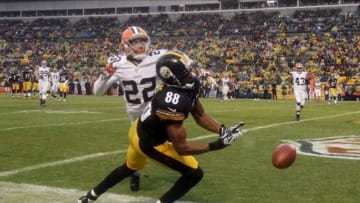 Dec 29, 2013; Pittsburgh, PA, USA; Pittsburgh Steelers wide receiver Emmanuel Sanders (88) misses a pass as he is covered by Cleveland Browns defensive back Buster Skrine (22) in the first quarter at Heinz Field. Mandatory Credit: Jason Bridge-USA TODAY Sports