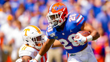 GAINESVILLE, FL- SEPTEMBER 21: Malik Davis #20 of the Florida Gators runs with the ball during the first half of the game in front of Henry To'o To'o #11 of the Tennessee Volunteers at Ben Hill Griffin Stadium on September 21, 2019 in Gainesville, Florida. (Photo by Carmen Mandato/Getty Images)