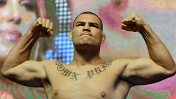 LAS VEGAS, NV - JULY 08: Mixed martial artists Cain Velasquez poses on the scale during his weigh-in for UFC 200 at T-Mobile Arena on July 8, 2016 in Las Vegas, Nevada. Velasquez will meet Travis Browne in a heavyweight bout on July 9 at T-Mobile Arena. (Photo by Ethan Miller/Getty Images)