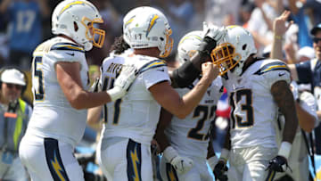 CARSON, CALIFORNIA - SEPTEMBER 08: Keenan Allen #13 is congratulated after scoring a touchdown by Philip Rivers #17, and Justin Jackson #22 of the Los Angeles Chargers during the first half of a game against the Indianapolis Coltsat Dignity Health Sports Park on September 08, 2019 in Carson, California. (Photo by Sean M. Haffey/Getty Images)