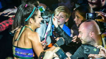 Bayley mixes with spectators during the WWE show at Zenith Arena on may 09, 2017 in Lille, France. / AFP PHOTO / PHILIPPE HUGUEN (Photo credit should read PHILIPPE HUGUEN/AFP/Getty Images)