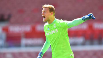 STOKE ON TRENT, ENGLAND - JULY 12: Adam Davies of Stoke City gestures during the Sky Bet Championship match between Stoke City and Birmingham City at Bet365 Stadium on July 12, 2020 in Stoke on Trent, England. (Photo by Nathan Stirk/Getty Images)