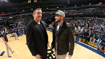 MEMPHIS, TN - DECEMBER 7: Memphis Grizzlies owner Robert Pera and Justin Timberlake talk before the game between the Memphis Grizzlies and the Miami Heat on December 7, 2014 at FedExForum in Memphis, Tennessee. NOTE TO USER: User expressly acknowledges and agrees that, by downloading and or using this photograph, User is consenting to the terms and conditions of the Getty Images License Agreement. Mandatory Copyright Notice: Copyright 2014 NBAE (Photo by Joe Murphy/NBAE via Getty Images)