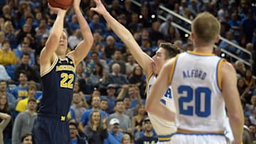 December 10, 2016; Los Angeles, CA, USA; Michigan Wolverines guard Duncan Robinson (22) shoots against the UCLA Bruins during the first half at Pauley Pavilion. Mandatory Credit: Gary A. Vasquez-USA TODAY Sports