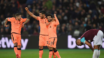 LONDON, ENGLAND - NOVEMBER 04: Mohamed Salah of Liverpool celebrates with team mates after scoring his sides fourth goal during the Premier League match between West Ham United and Liverpool at London Stadium on November 4, 2017 in London, England. (Photo by Shaun Botterill/Getty Images)