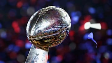 HOUSTON, TX - FEBRUARY 05: The New England Patriots celebrate with the Vince Lombardi Trophy after defeating the Atlanta Falcons during Super Bowl 51 at NRG Stadium on February 5, 2017 in Houston, Texas. The Patriots defeated the Falcons 34-28. (Photo by Al Bello/Getty Images)