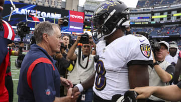 FOXBOROUGH, MASSACHUSETTS - SEPTEMBER 25: Head coach Bill Belichick of the New England Patriots shakes hands with quarterback Lamar Jackson #8 of the Baltimore Ravens after Baltimore's 37-26 win at Gillette Stadium on September 25, 2022 in Foxborough, Massachusetts. (Photo by Maddie Meyer/Getty Images)