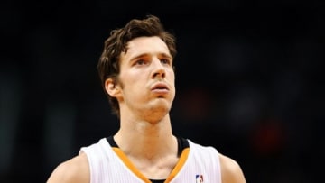 Jan 2, 2014; Phoenix, AZ, USA; Phoenix Suns guard Goran Dragic (1) shoots a free throw against the Memphis Grizzlies in the second half at US Airways Center. The Grizzlies won 99-91. Mandatory Credit: Jennifer Stewart-USA TODAY Sports
