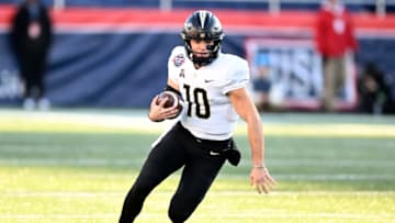 ANNAPOLIS, MARYLAND - DECEMBER 28: John Rhys Plumlee #10 of the UCF Knights runs the ball against the Duke Blue Devils in the Military Bowl Presented by Peraton at Navy-Marine Corps Memorial Stadium on December 28, 2022 in Annapolis, Maryland. (Photo by G Fiume/Getty Images)