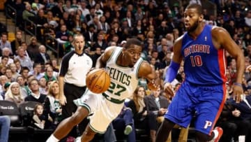 Dec 18, 2013; Boston, MA, USA; Boston Celtics shooting guard Jordan Crawford (27) drives past Detroit Pistons power forward Greg Monroe (10) during the fourth quarter of Detroit