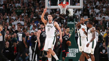 MILWAUKEE, WI - MAY 15: Brook Lopez #11 of the Milwaukee Bucks reacts during a game against the Toronto Raptors during Game One of the Eastern Conference Finals of the 2019 NBA Playoffs on May 15, 2019 at the Fiserv Forum Center in Milwaukee, Wisconsin. NOTE TO USER: User expressly acknowledges and agrees that, by downloading and or using this Photograph, user is consenting to the terms and conditions of the Getty Images License Agreement. Mandatory Copyright Notice: Copyright 2019 NBAE (Photo by Gary Dineen/NBAE via Getty Images).
