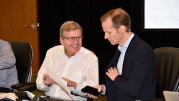 ORLANDO, FL - JUNE 22: John Hammond and Jeff Weltman of the Orlando Magic talk in the war room during the 2017 NBA Draft on June 22, 2017 at Amway Center in Orlando, Florida. NOTE TO USER: User expressly acknowledges and agrees that, by downloading and or using this photograph, User is consenting to the terms and conditions of the Getty Images License Agreement. Mandatory Copyright Notice: Copyright 2017 NBAE (Photo by Fernando Medina/NBAE via Getty Images)