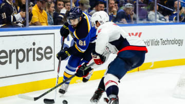 ST. LOUIS, MO - OCTOBER 01: St. Louis Blues' Wade Megan, left, pushes the puck past Washington Capitals' Matt Niskanen, right, during the third period of an NHL hockey preseason game October 1, 2017. The Washington Capitals defeated the St. Louis Blues 4-3 at Scottrade Center in St. Louis, MO. (Photo by Tim Spyers/Icon Sportswire via Getty Images)