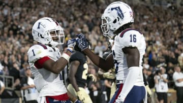 Sep 24, 2022; West Lafayette, Indiana, USA; Florida Atlantic Owls wide receiver LaJohntay Wester (1) celebrates a touchdown with wide receiver Tony Johnson (16) during the second quarter against the Purdue Boilermakers at Ross-Ade Stadium. Mandatory Credit: Marc Lebryk-USA TODAY Sports