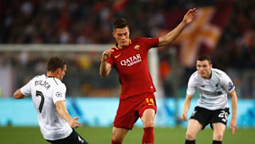 ROME, ITALY - MAY 02: Patrik Schick of AS Roma is tackled by James Milner of Liverpool during the UEFA Champions League Semi Final Second Leg match between A.S. Roma and Liverpool at Stadio Olimpico on May 2, 2018 in Rome, Italy. (Photo by Julian Finney/Getty Images)