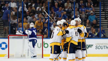 TAMPA, FL - SEPTEMBER 22: Nashville Predators defenseman Ryan Ellis (4) celebrates with teammates after scoring a goal in the second period of the NHL preseason game between the Nashville Predators and Tampa Bay Lightning on September 22, 2018, at Amalie Arena in Tampa, FL. (Photo by Mark LoMoglio/Icon Sportswire via Getty Images)
