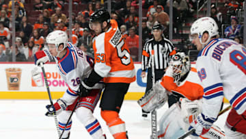 PHILADELPHIA, PA - MARCH 22: Jimmy Vesey #26 and Pavel Buchnevich #89 of the New York Rangers battle on a scoring opportunity against Shayne Gostisbehere #53 and Alex Lyon #49 of the Philadelphia Flyers on March 22, 2018 at the Wells Fargo Center in Philadelphia, Pennsylvania. (Photo by Len Redkoles/NHLI via Getty Images)