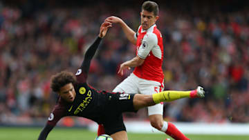 LONDON, ENGLAND - APRIL 02: Gabriel Paulista of Arsenal and Leroy Sane of Manchester City during the Premier League match between Arsenal and Manchester City at Emirates Stadium on April 2, 2017 in London, England. (Photo by Catherine Ivill - AMA/Getty Images)