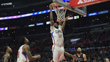 Jan 2, 2017; Los Angeles, CA, USA; Los Angeles Clippers forward Luc Mbah a Moute (12) shoots the ball in the second quarter against the Phoenix Suns during at Staples Center. Mandatory Credit: Kirby Lee-USA TODAY Sports
