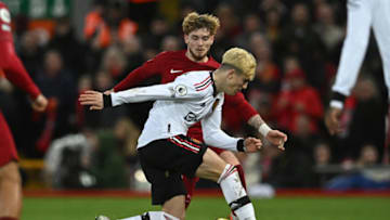 Manchester United's Argentinian midfielder Alejandro Garnacho vies with Liverpool's English midfielder Harvey Elliott during the English Premier League football match between Liverpool and Manchester United at Anfield in Liverpool, north west England on March 5, 2023. (Photo by Paul ELLIS / AFP) / RESTRICTED TO EDITORIAL USE. No use with unauthorized audio, video, data, fixture lists, club/league logos or 'live' services. Online in-match use limited to 120 images. An additional 40 images may be used in extra time. No video emulation. Social media in-match use limited to 120 images. An additional 40 images may be used in extra time. No use in betting publications, games or single club/league/player publications. / (Photo by PAUL ELLIS/AFP via Getty Images)