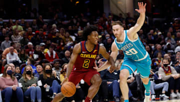 CLEVELAND, OHIO - OCTOBER 22: Collin Sexton #2 of the Cleveland Cavaliers dribbles on Gordon Hayward #20 of the Charlotte Hornets in the second half at Rocket Mortgage Fieldhouse on October 22, 2021 in Cleveland, Ohio. NOTE TO USER: User expressly acknowledges and agrees that, by downloading and or using this photograph, User is consenting to the terms and conditions of the Getty Images License Agreement. (Photo by Rick Osentoski/Getty Images)