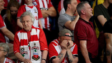LEICESTER, ENGLAND - APRIL 19: Southampton fans react during the Premier League match between Leicester City and Southampton at The King Power Stadium on April 19, 2018 in Leicester, England. (Photo by Shaun Botterill/Getty Images)