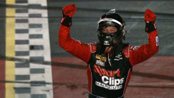 DARLINGTON, SOUTH CAROLINA - SEPTEMBER 02: Erik Jones, driver of the #20 Sport Clips Throwback Toyota, celebrates after winning the Monster Energy NASCAR Cup Series Bojangles' Southern 500 at Darlington Raceway on September 02, 2019 in Darlington, South Carolina. (Photo by Sean Gardner/Getty Images)