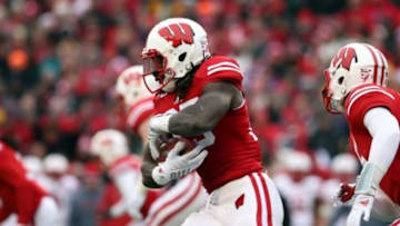 Nov 15, 2014; Madison, WI, USA; Wisconsin Badgers running back Melvin Gordon (25) rushes for yardage during the game with the Nebraska Cornhuskers during the first half at Camp Randall Stadium. Mandatory Credit: Mary Langenfeld-USA TODAY Sports