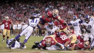 Aug 25, 2013; San Francisco, CA, USA; San Francisco 49ers running back Anthony Dixon (24) scores a touchdown against the Minnesota Vikings in the fourth quarter at Candlestick Park. The 49ers defeated the Vikings 34-14. Mandatory Credit: Cary Edmondson-USA TODAY Sports